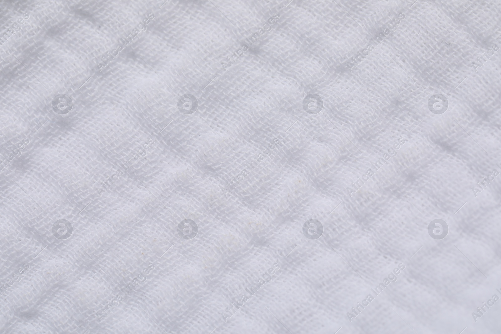 Photo of Texture of soft white fabric as background, top view