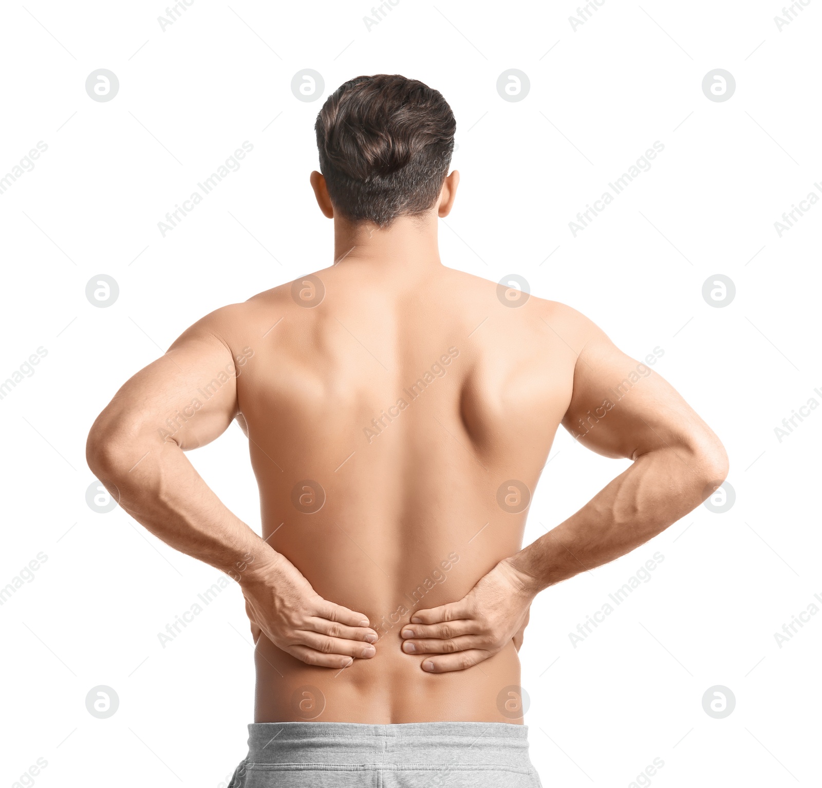 Photo of Young man suffering from back pain on white background