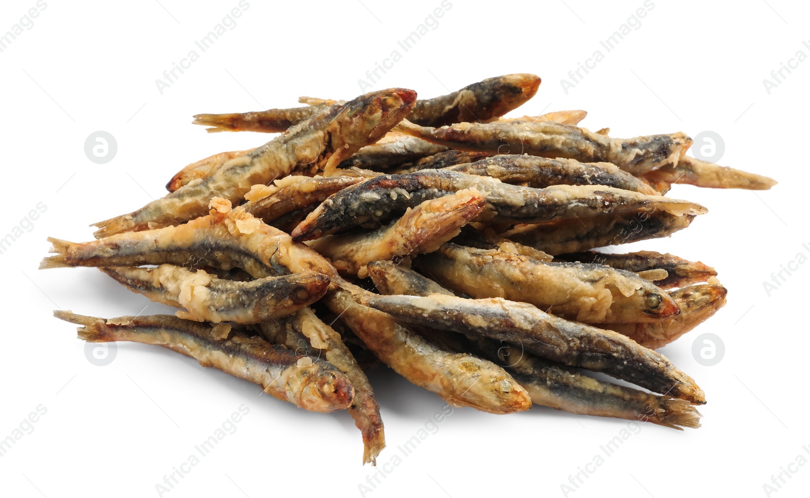 Photo of Pile of delicious fried anchovies on white background