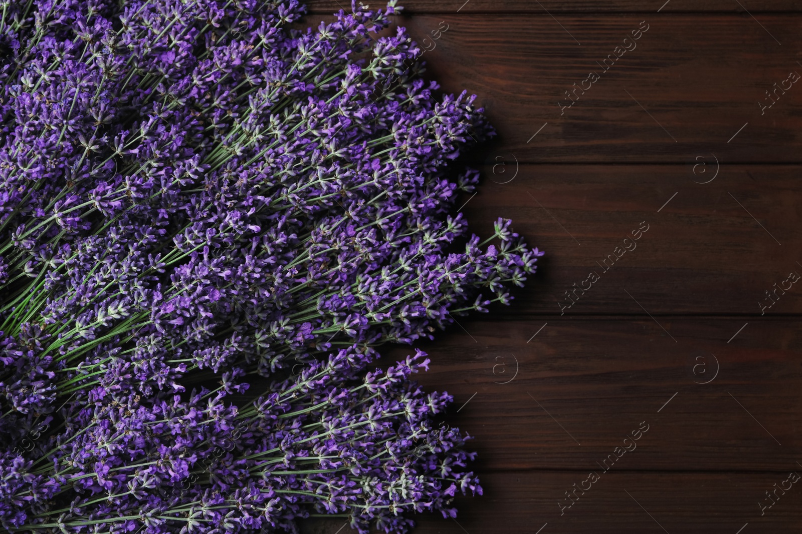 Photo of Beautiful fresh lavender flowers on wooden background, flat lay