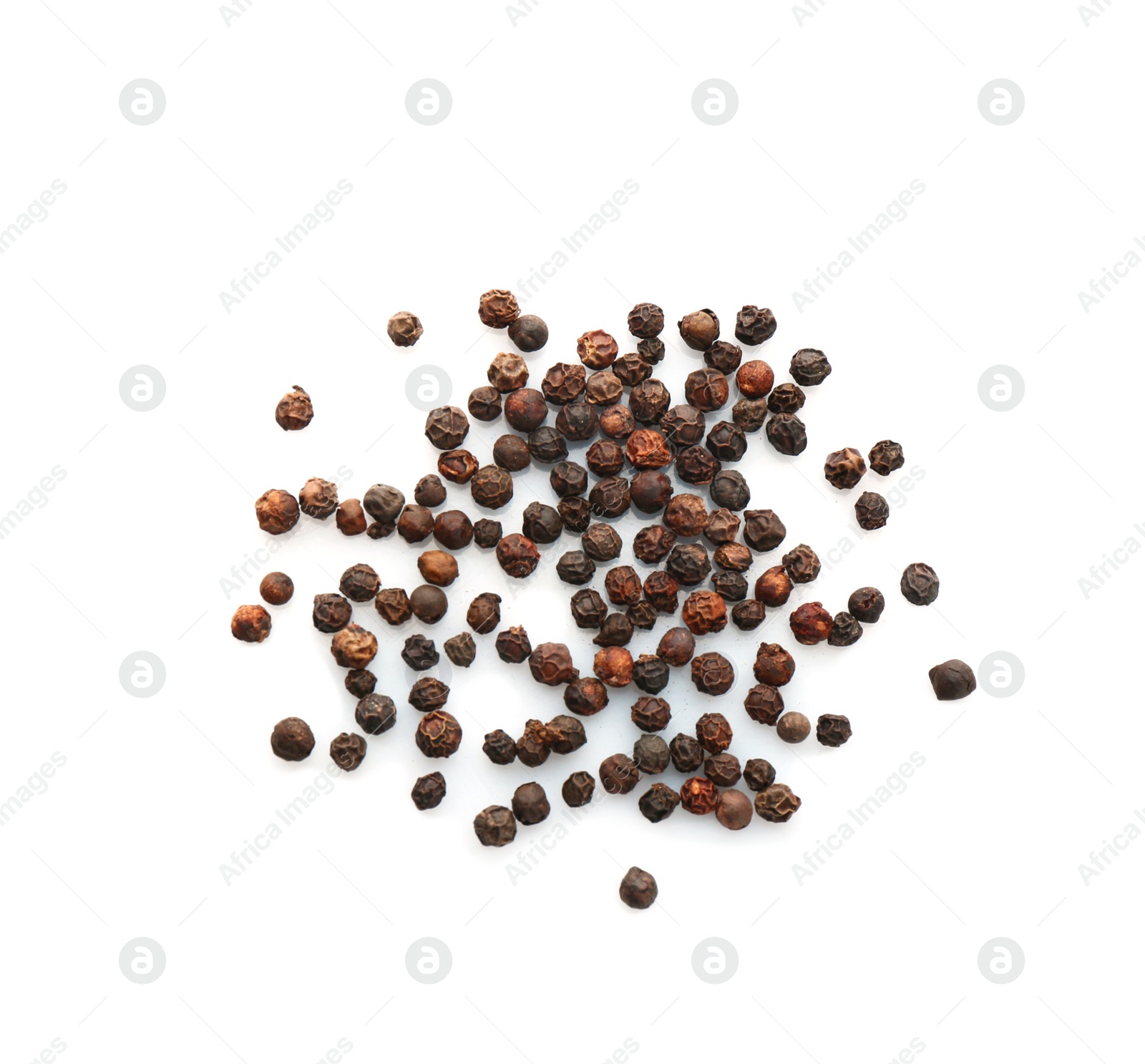 Photo of Black pepper grains on white background, top view. Natural spice