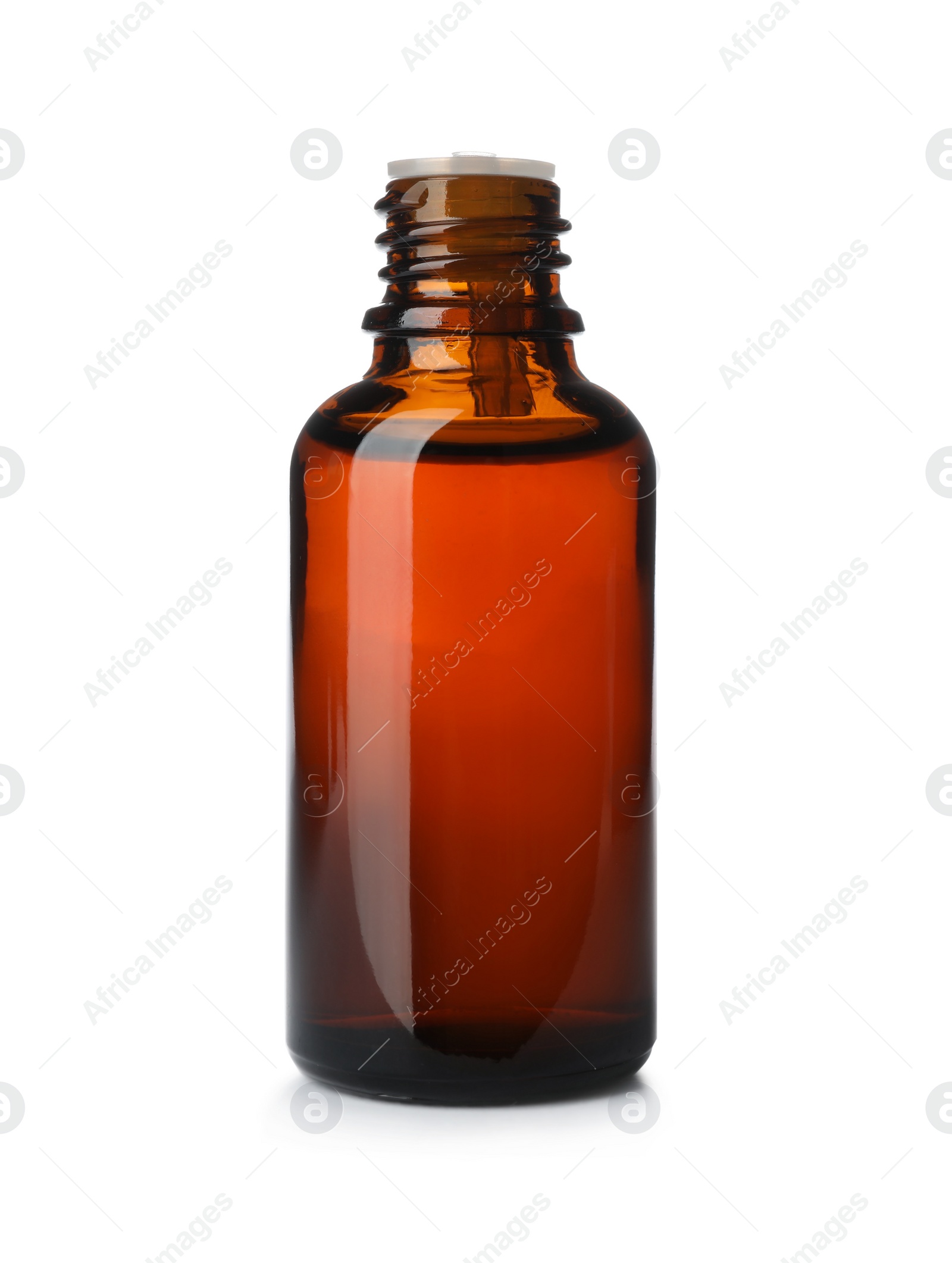 Photo of Bottle of essential oil isolated on white