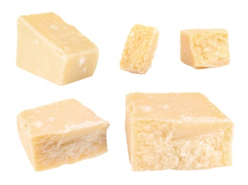 Image of Set with pieces of delicious parmesan cheese on white background 