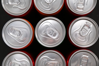 Photo of Energy drink in cans, top view. Functional beverage