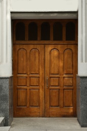 Photo of Building with vintage wooden door. Exterior design