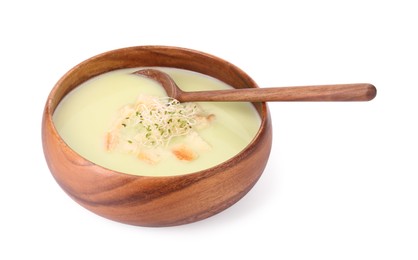 Photo of Bowl of tasty leek soup with croutons and spoon isolated on white