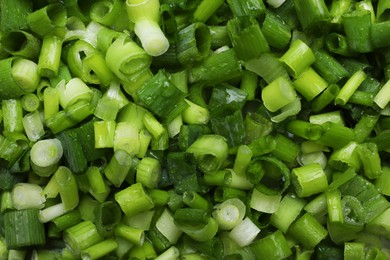 Photo of Fresh green onion as background, top view