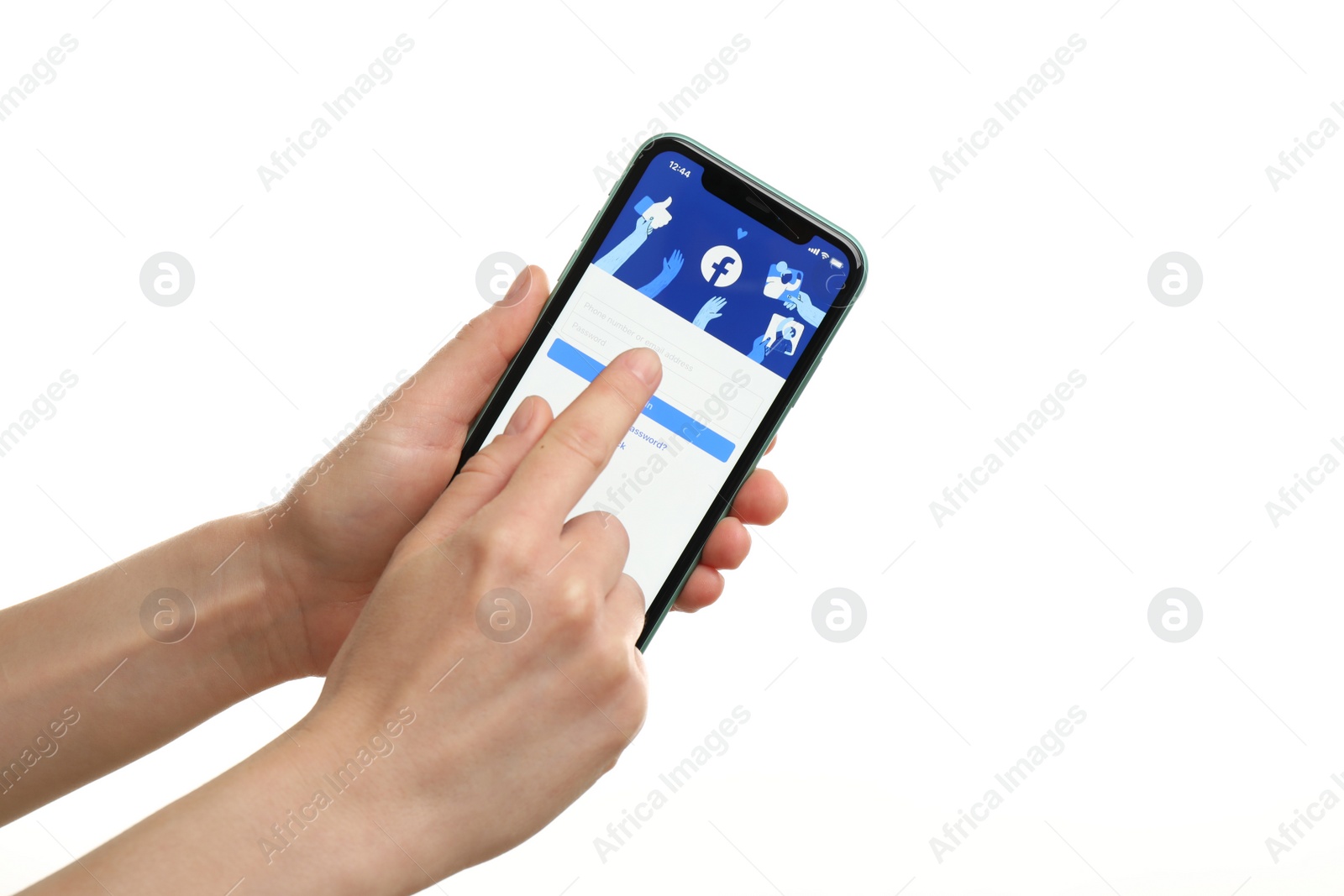 Photo of MYKOLAIV, UKRAINE - JULY 9, 2020: Woman holding  iPhone X with Facebook app on white background, closeup