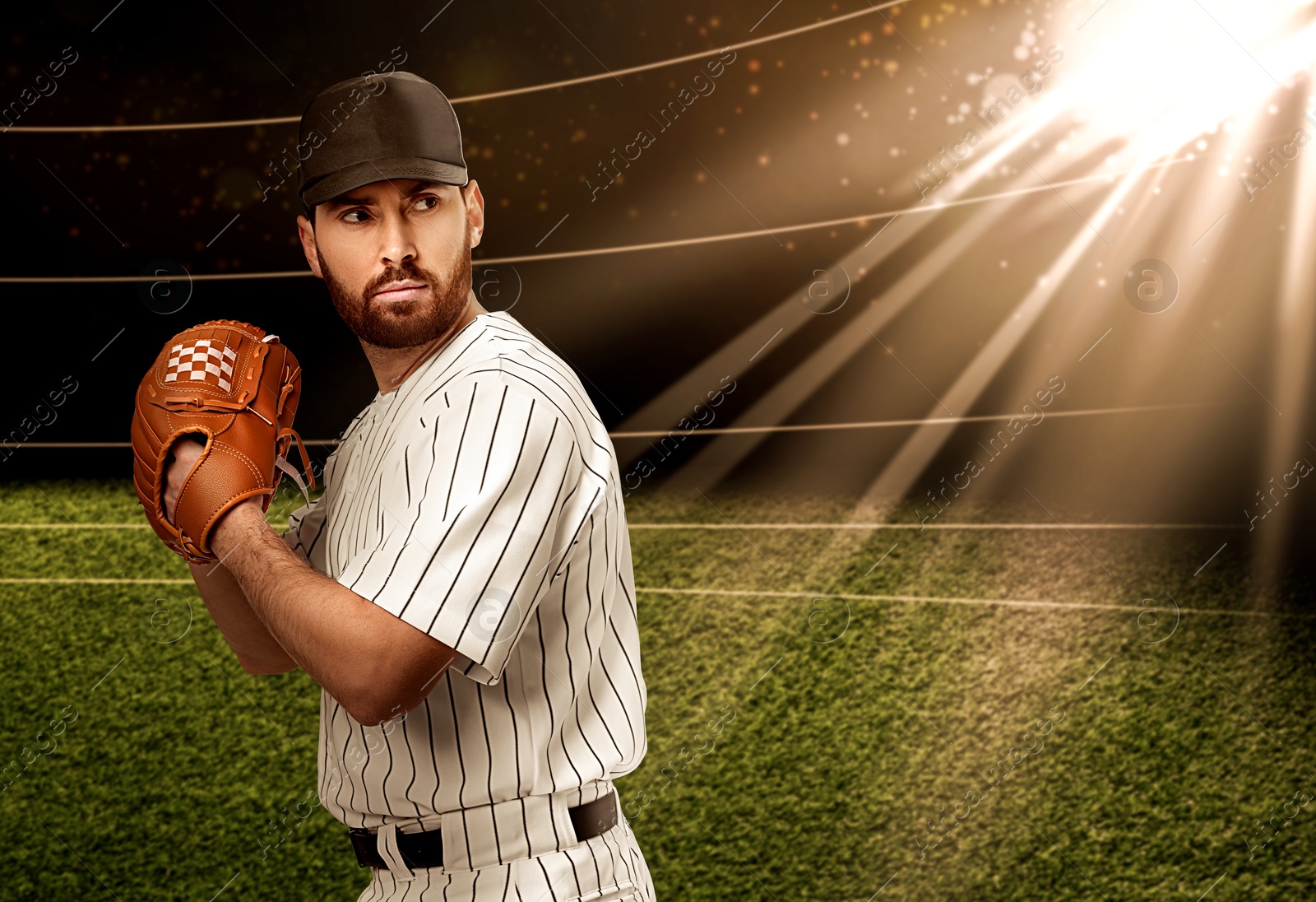 Image of Professional baseball player with glove on stadium. Space for text