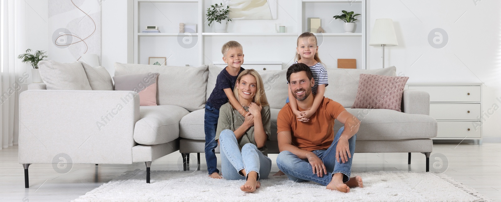 Image of Happy family with children at home. Banner design
