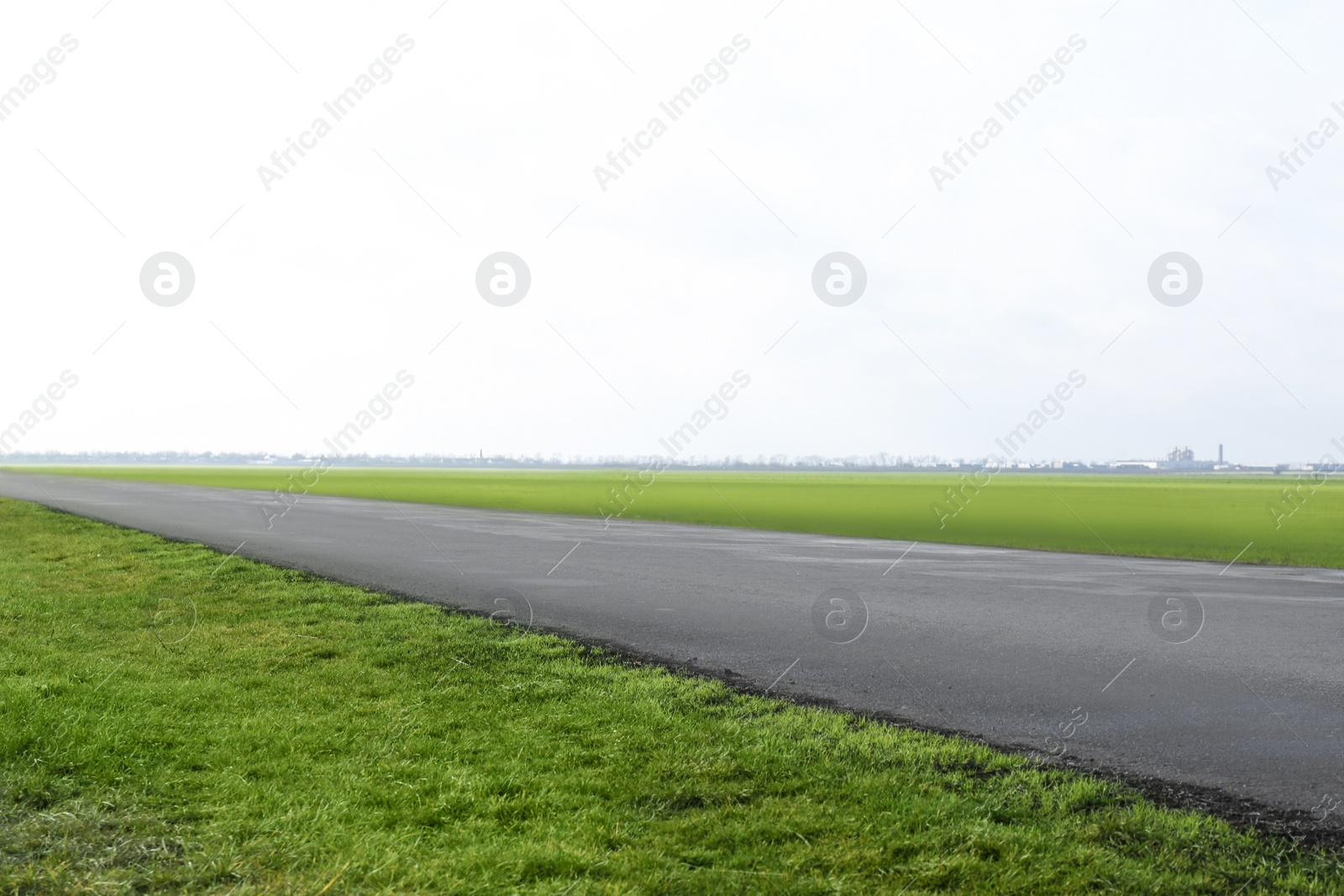 Photo of Beautiful view of asphalt highway without transport