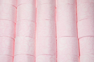 Photo of Many rolls of toilet paper as background