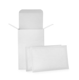 Photo of Medicine sachets and box on white background