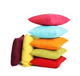 Different colorful decorative pillows on white background