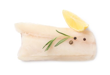 Photo of Piece of raw cod fish, rosemary, peppercorns and lemon isolated on white, top view