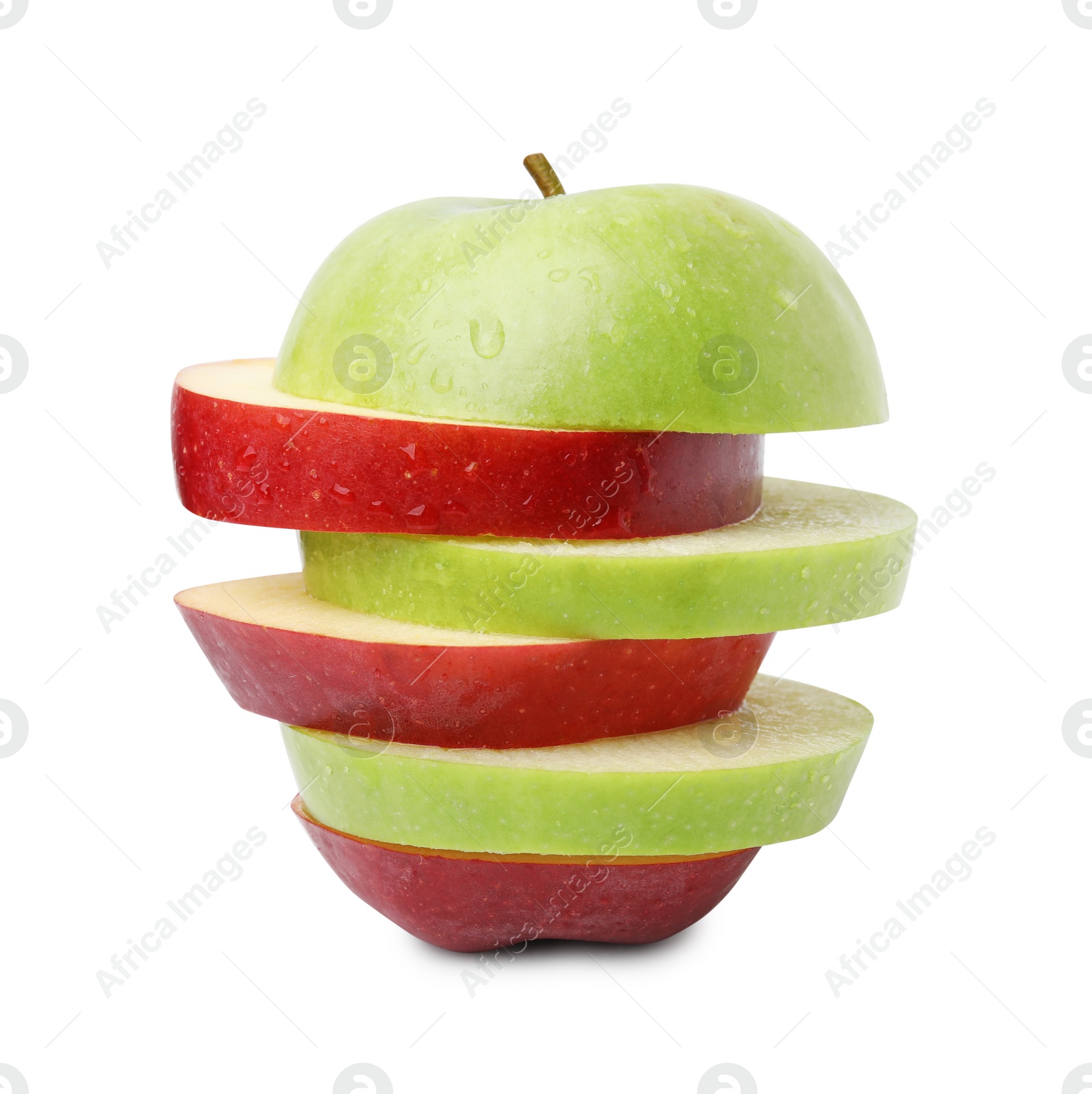 Slices of ripe apples isolated on white Photo of Slices of ripe apples isolated on white
