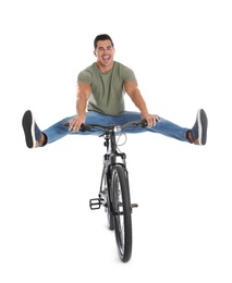 Handsome young man with modern bicycle on white background