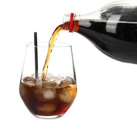 Pouring refreshing cola into glass with ice cubes on white background