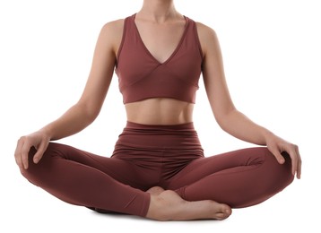 Woman in sportswear meditating on white background, closeup