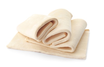 Photo of Fresh raw dough on white background