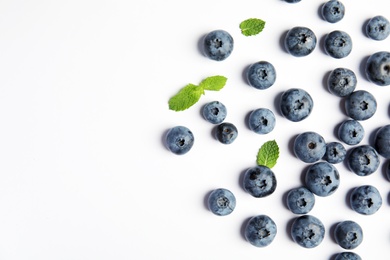 Photo of Flat lay composition with tasty blueberry and space for text on white background