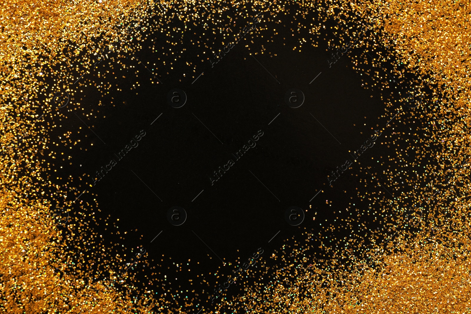 Photo of Frame made of gold glitter on black background, top view with space for text