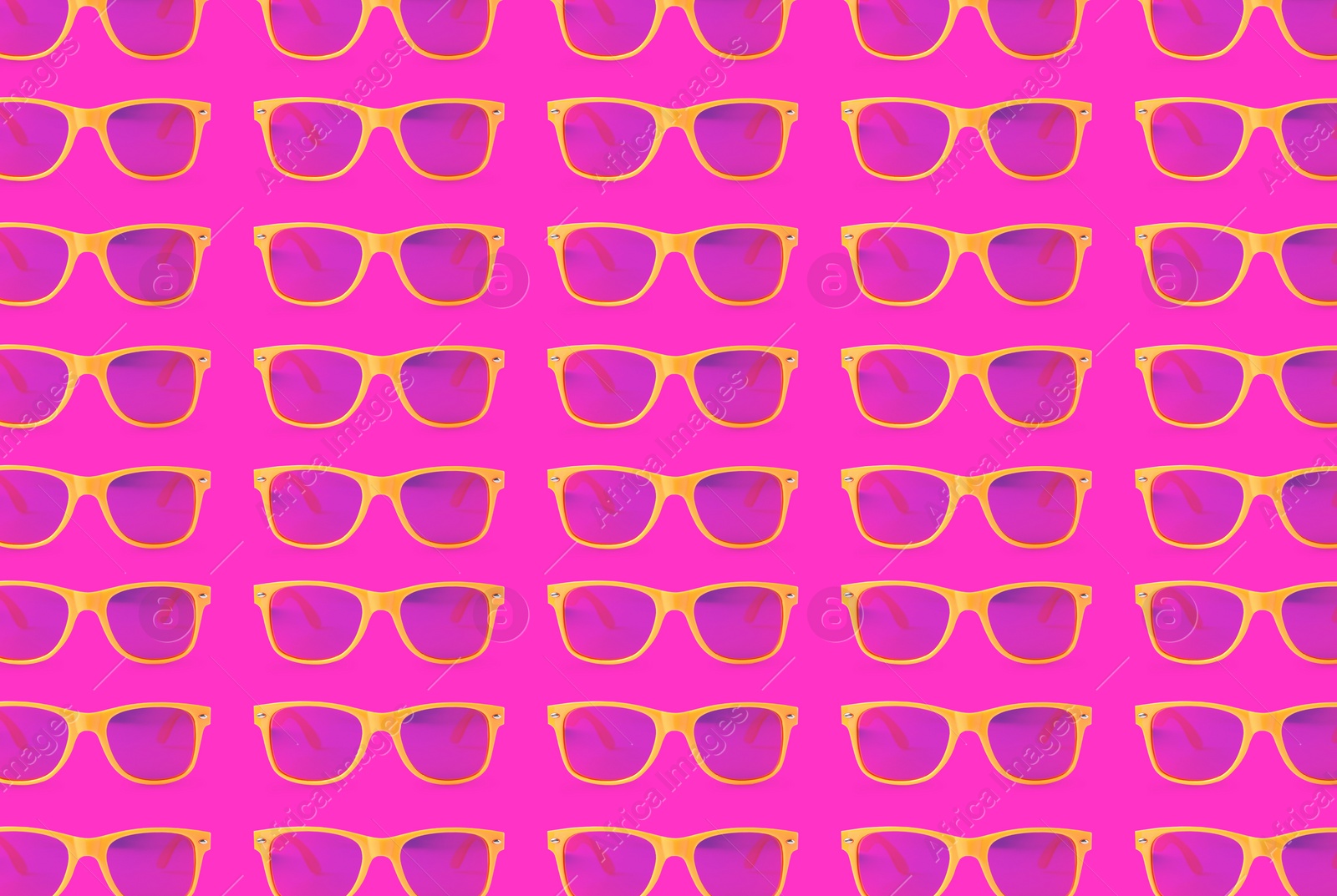 Image of Many stylish sunglasses on pink background. Seamless pattern design