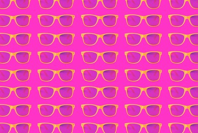 Image of Many stylish sunglasses on pink background. Seamless pattern design