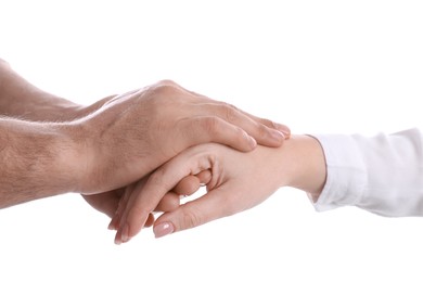 Man and woman holding hands on white background, closeup