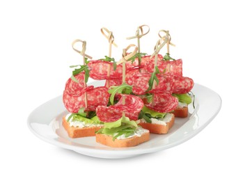 Photo of Tasty canapes with salami, greens and cream cheese isolated on white