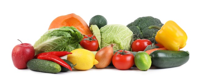 Pile of fresh ripe vegetables and fruits on white background