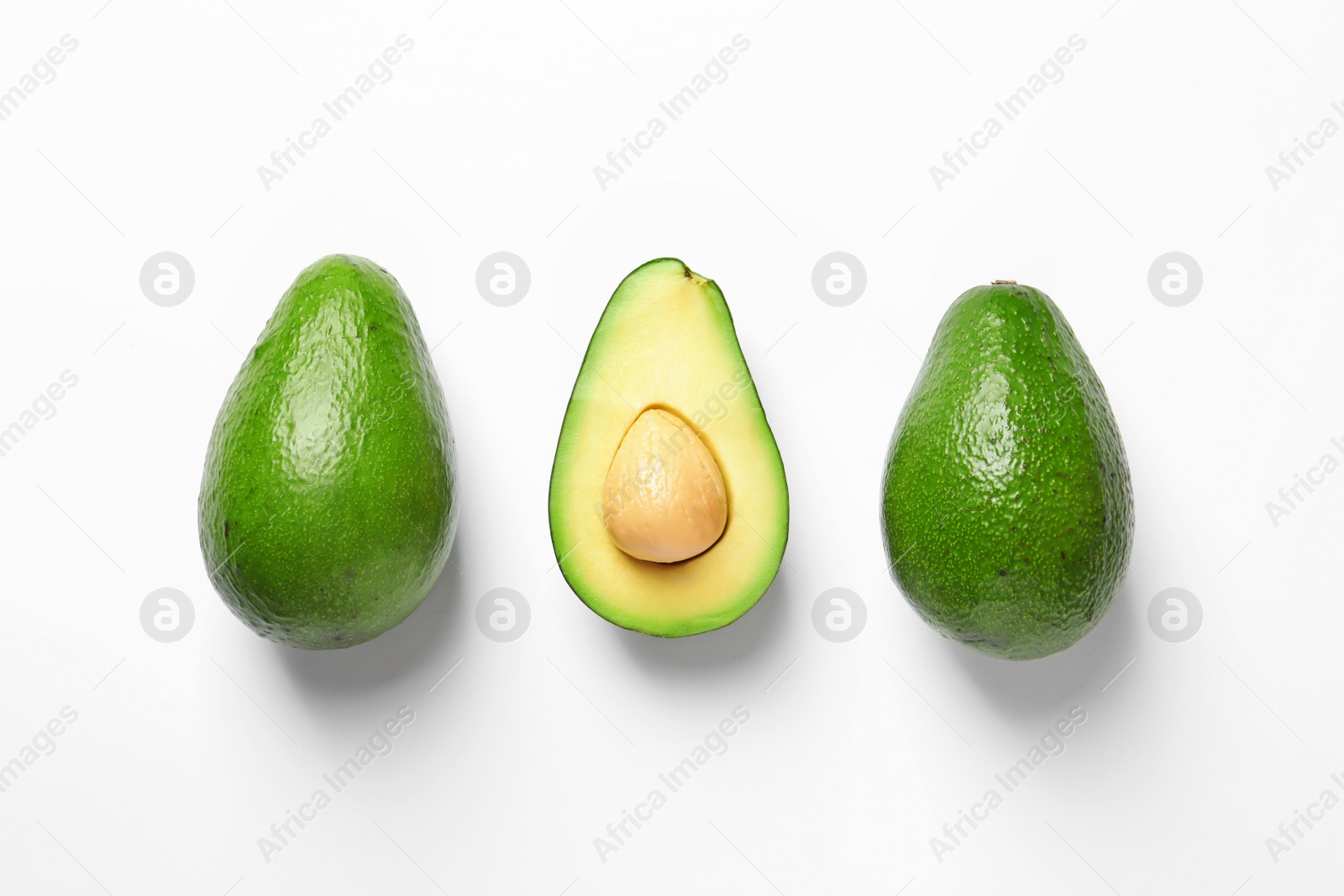 Photo of Composition with ripe fresh avocados on white background