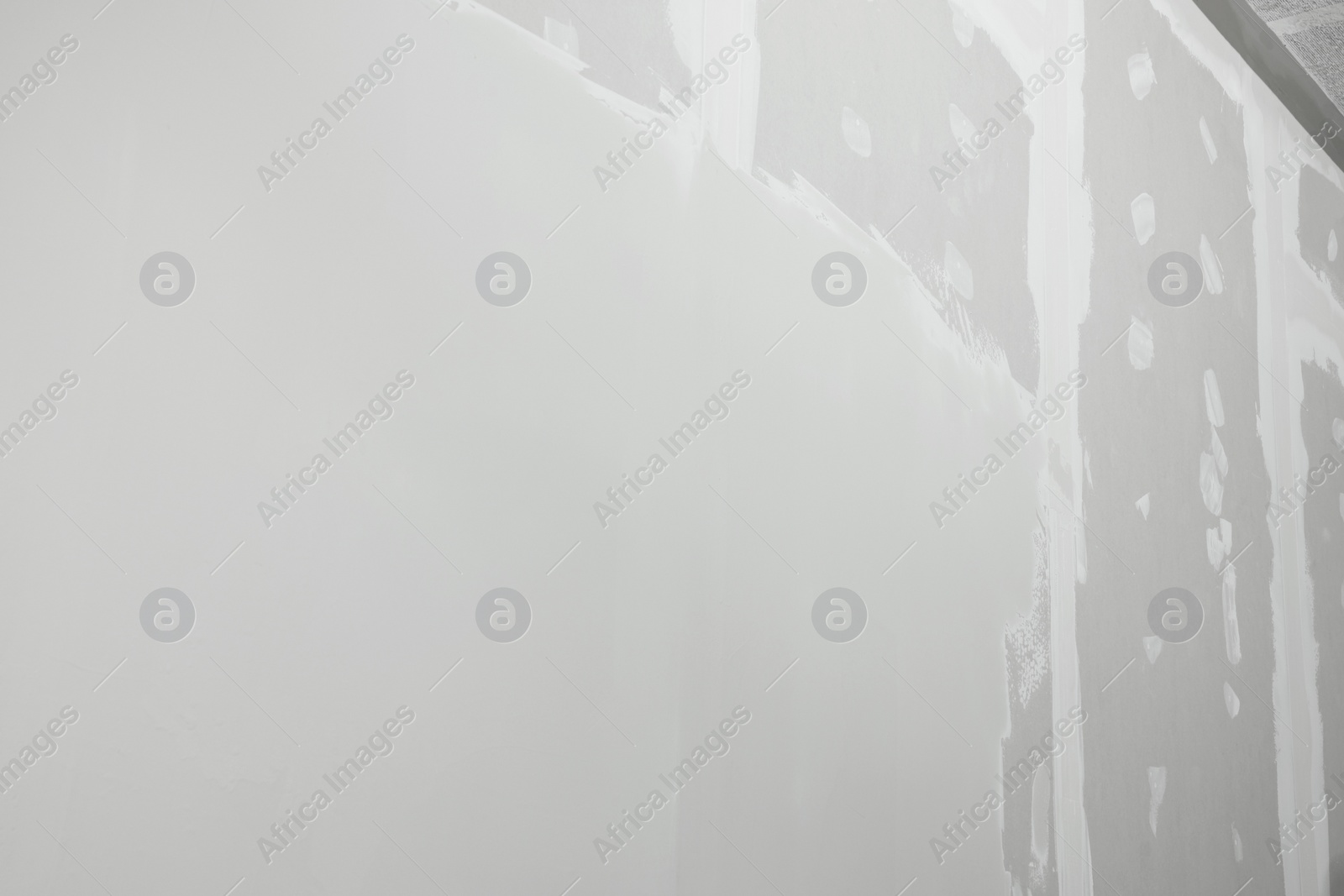 Photo of Wall covered with plaster as background, closeup