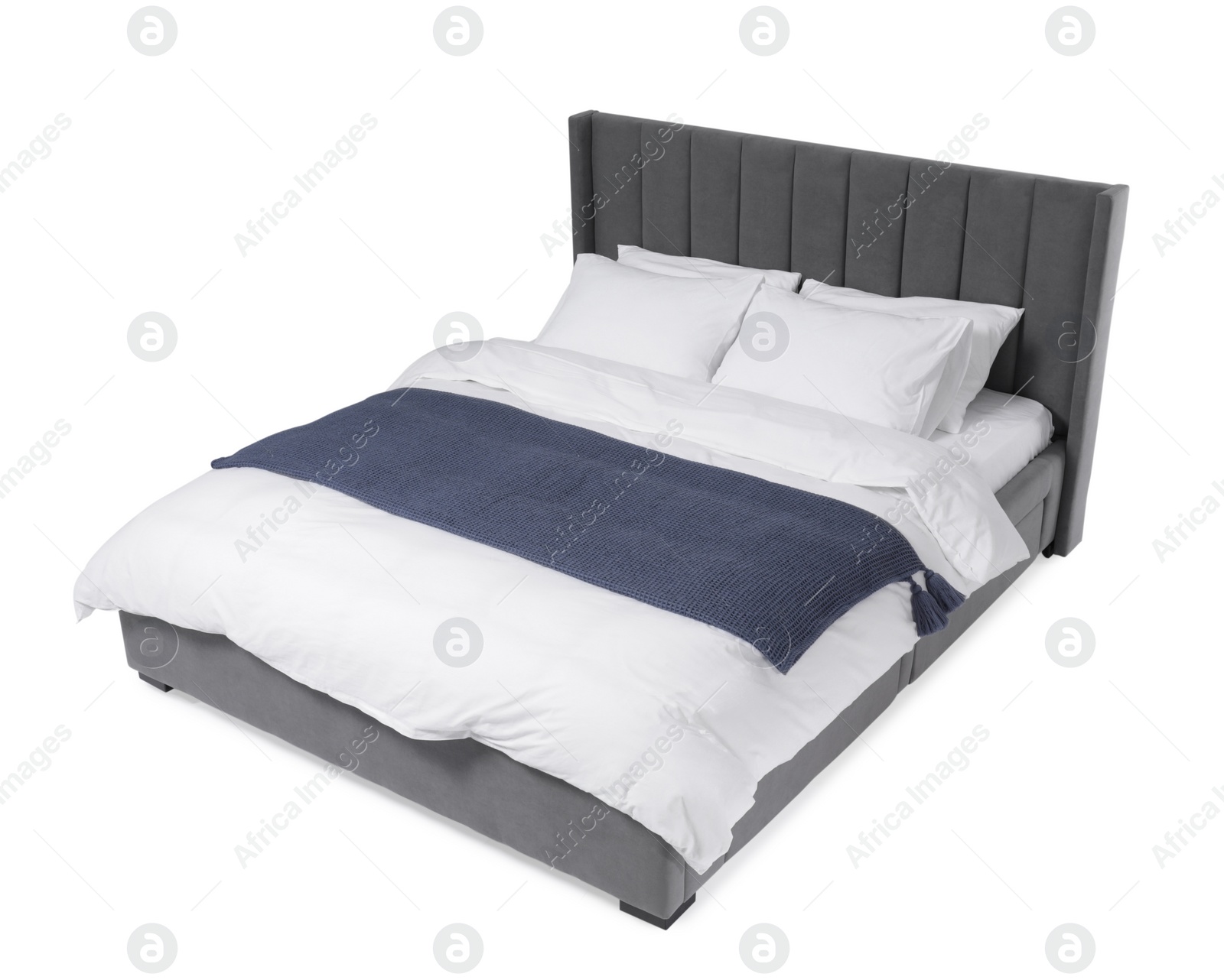 Photo of Comfortable gray bed with linens on white background