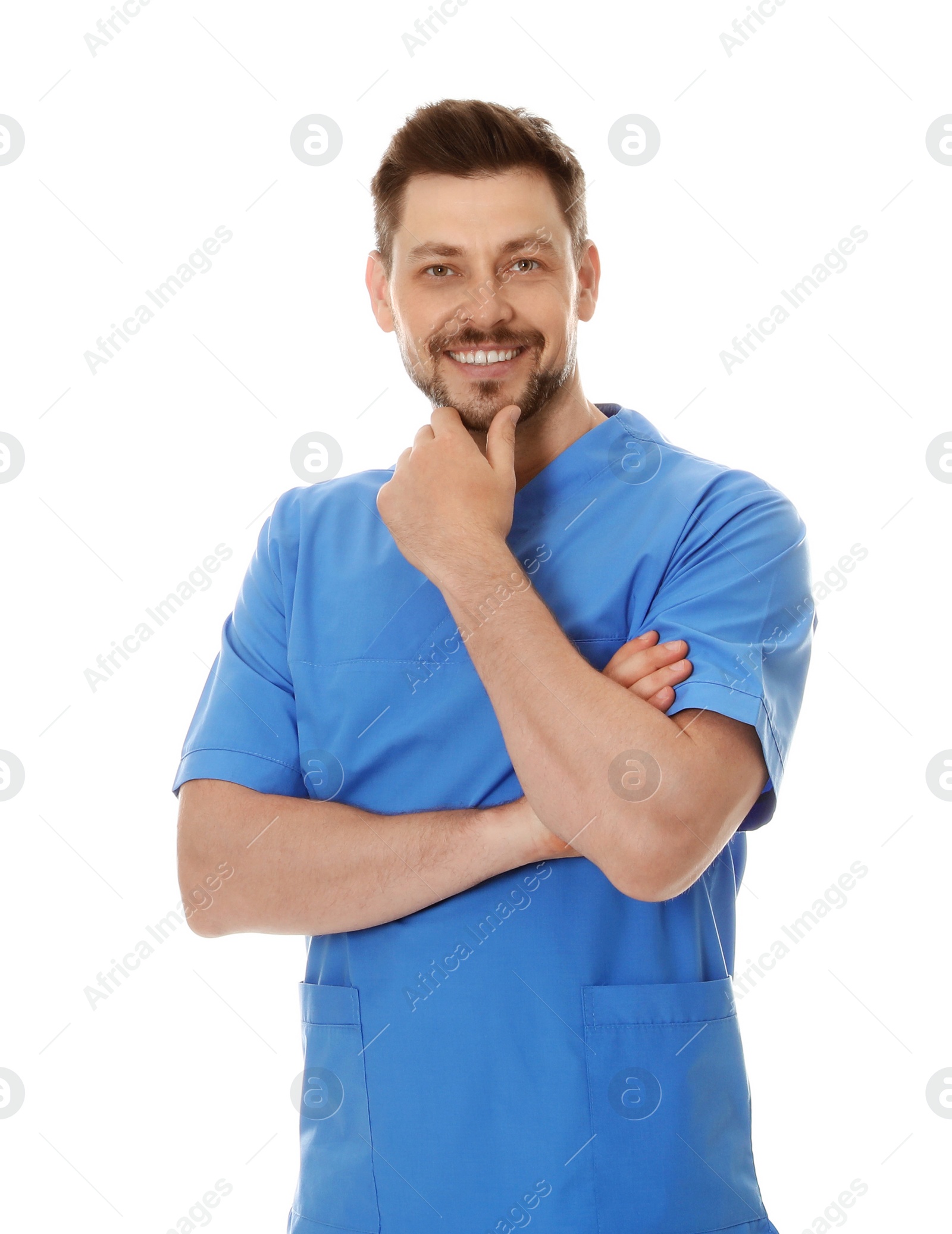 Photo of Portrait of male doctor in scrubs isolated on white. Medical staff