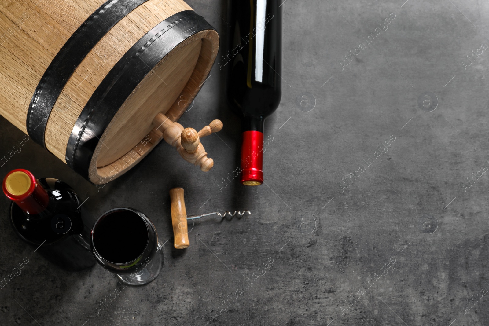 Photo of Flat lay composition with delicious wine on grey background