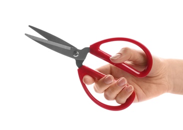 Woman holding scissors on white background, closeup