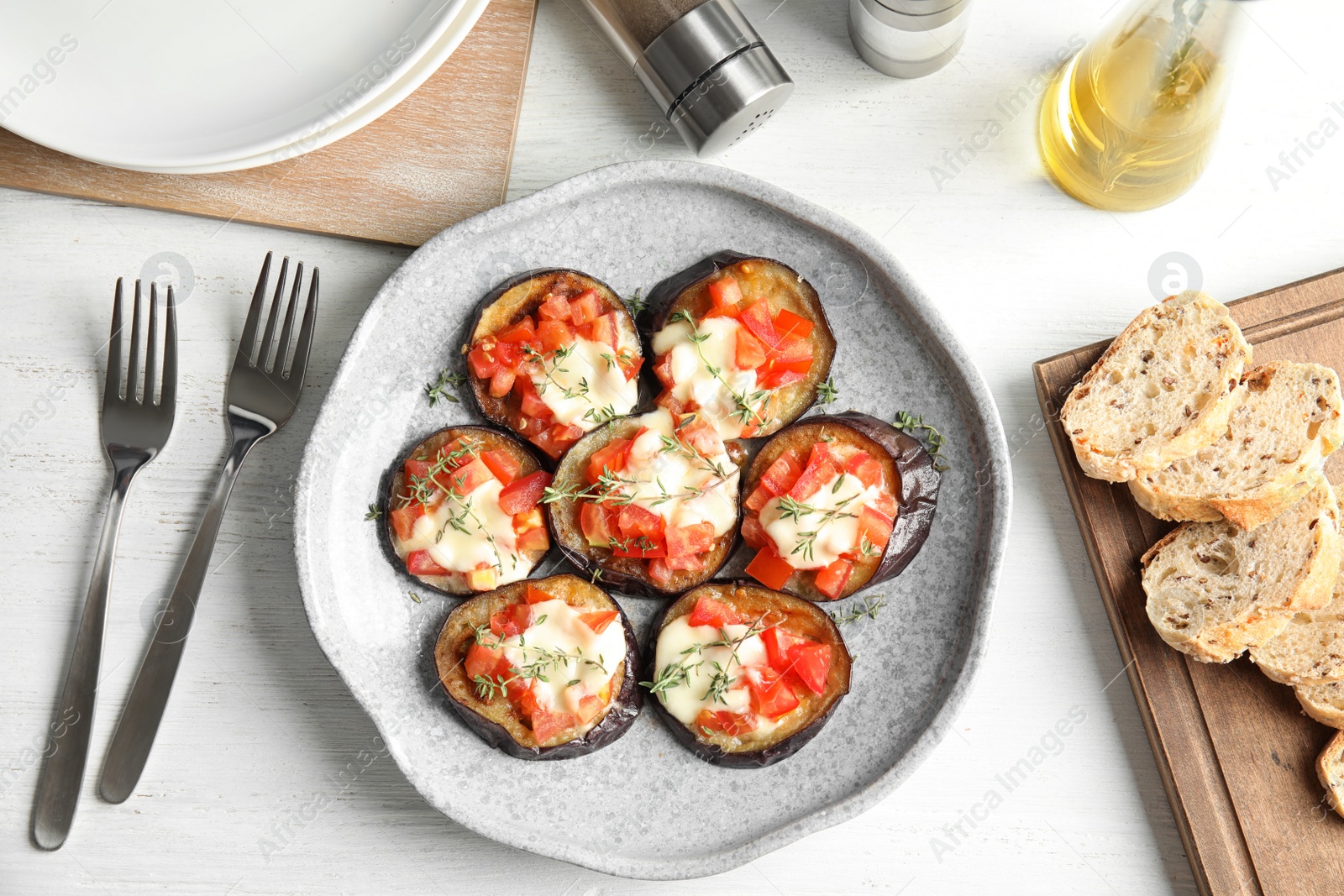 Photo of Flat lay composition with baked eggplant, tomatoes and cheese on table