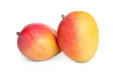 Photo of Delicious ripe juicy mangoes on white background