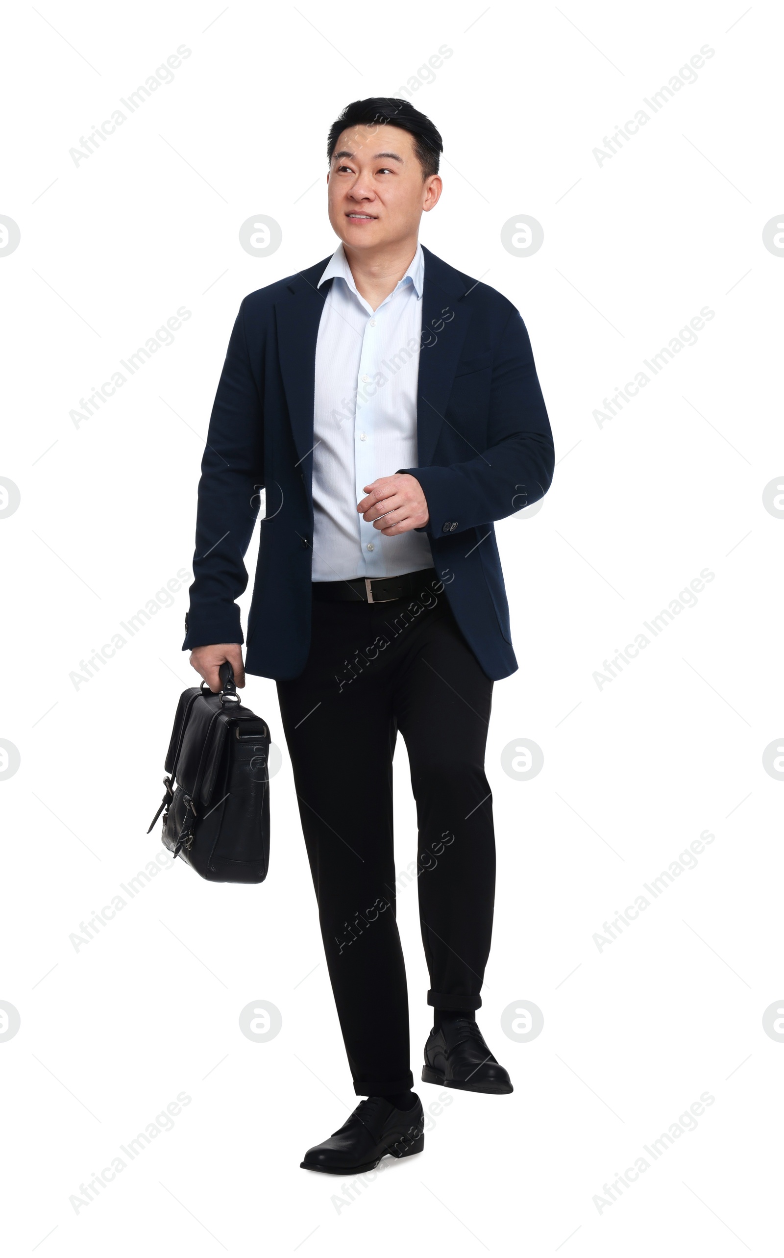 Photo of Businessman in suit with briefcase walking on white background