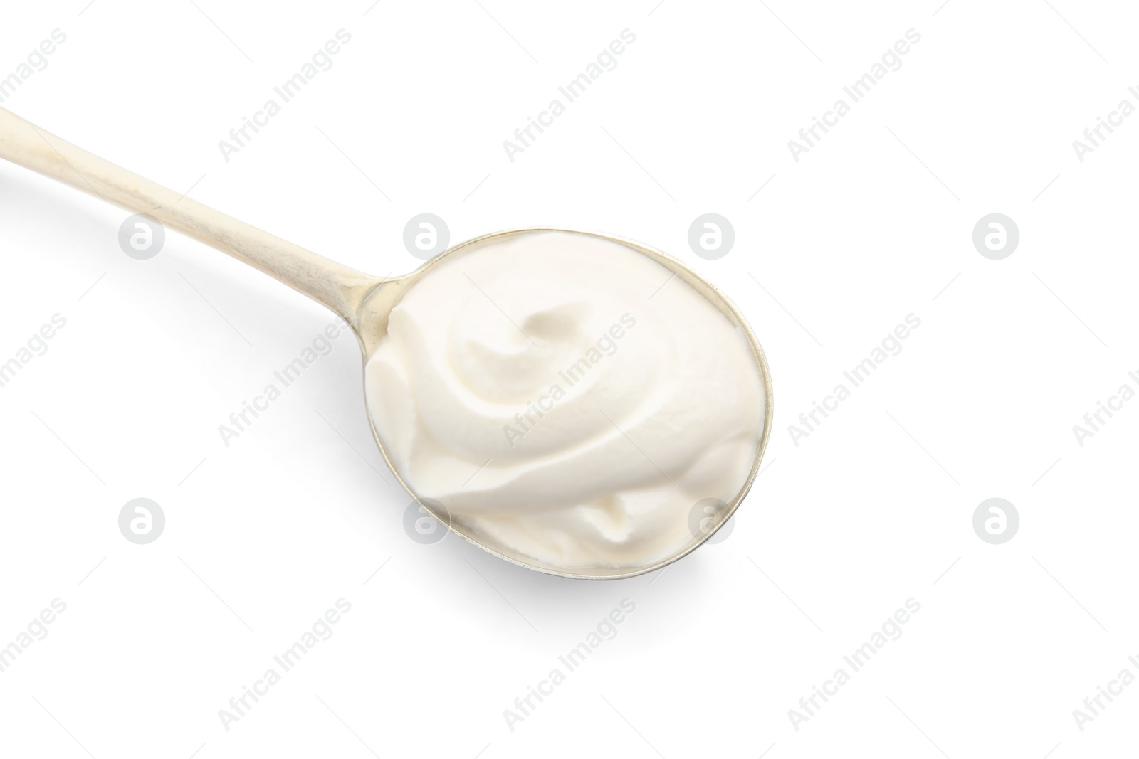 Photo of Metal spoon with sour cream on white background, top view