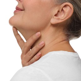 Mature woman touching her neck on white background, closeup