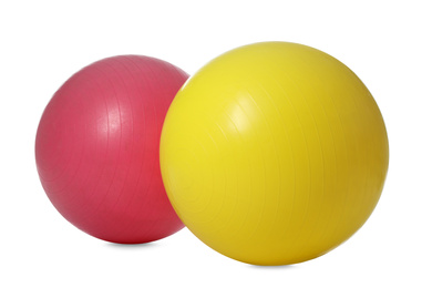 Photo of Different colorful fitness balls isolated on white