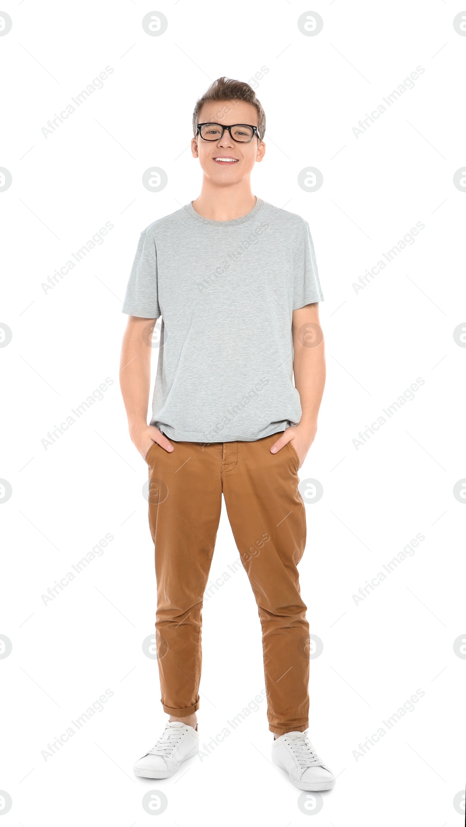 Photo of Teenager boy in casual clothes on white background