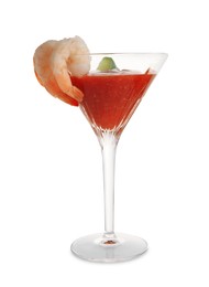 Photo of Tasty shrimp cocktail with sauce and lime in glass isolated on white