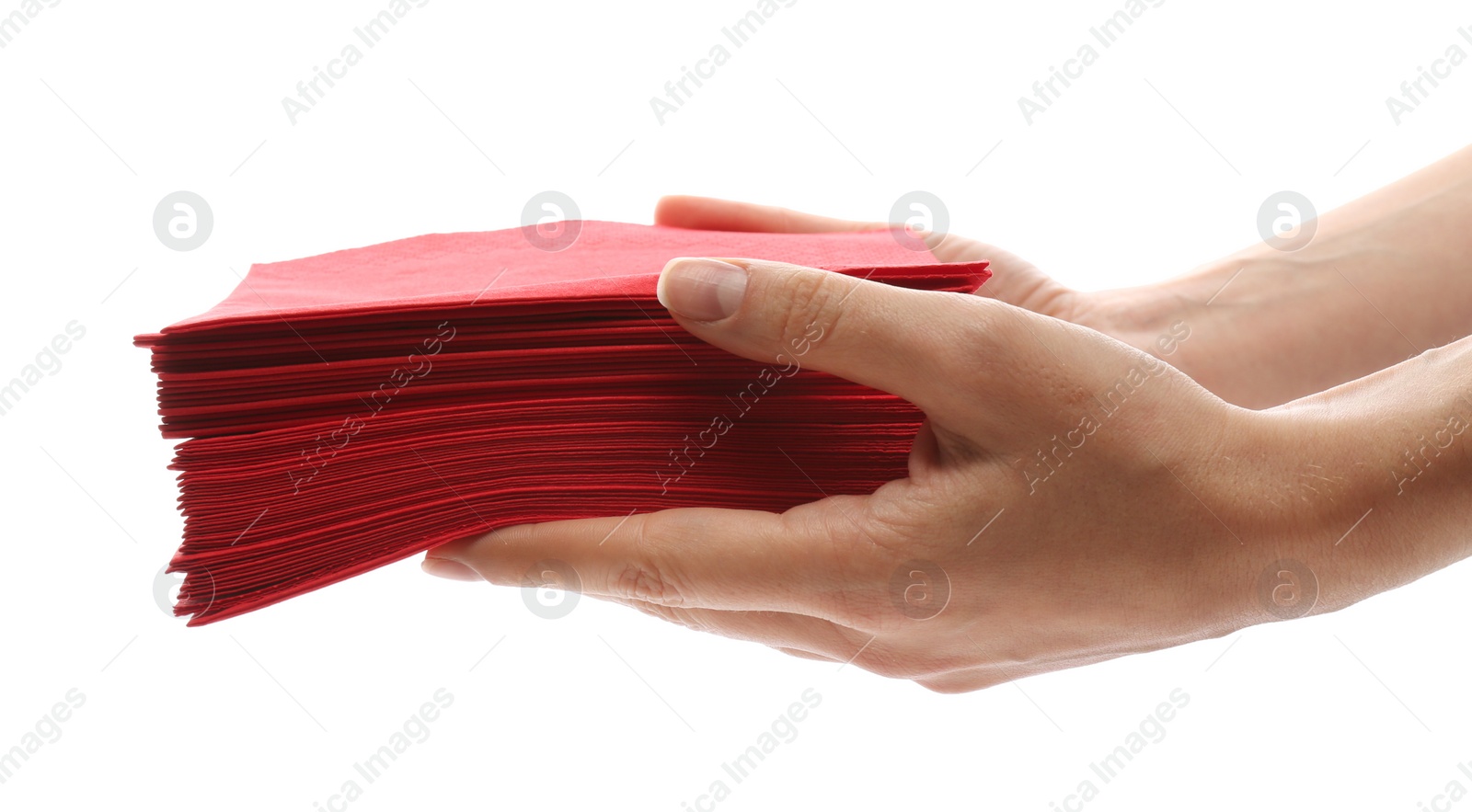 Photo of Woman holding stack of paper napkins on white background, closeup