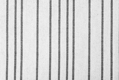 Photo of Texture of textile table napkin, closeup view