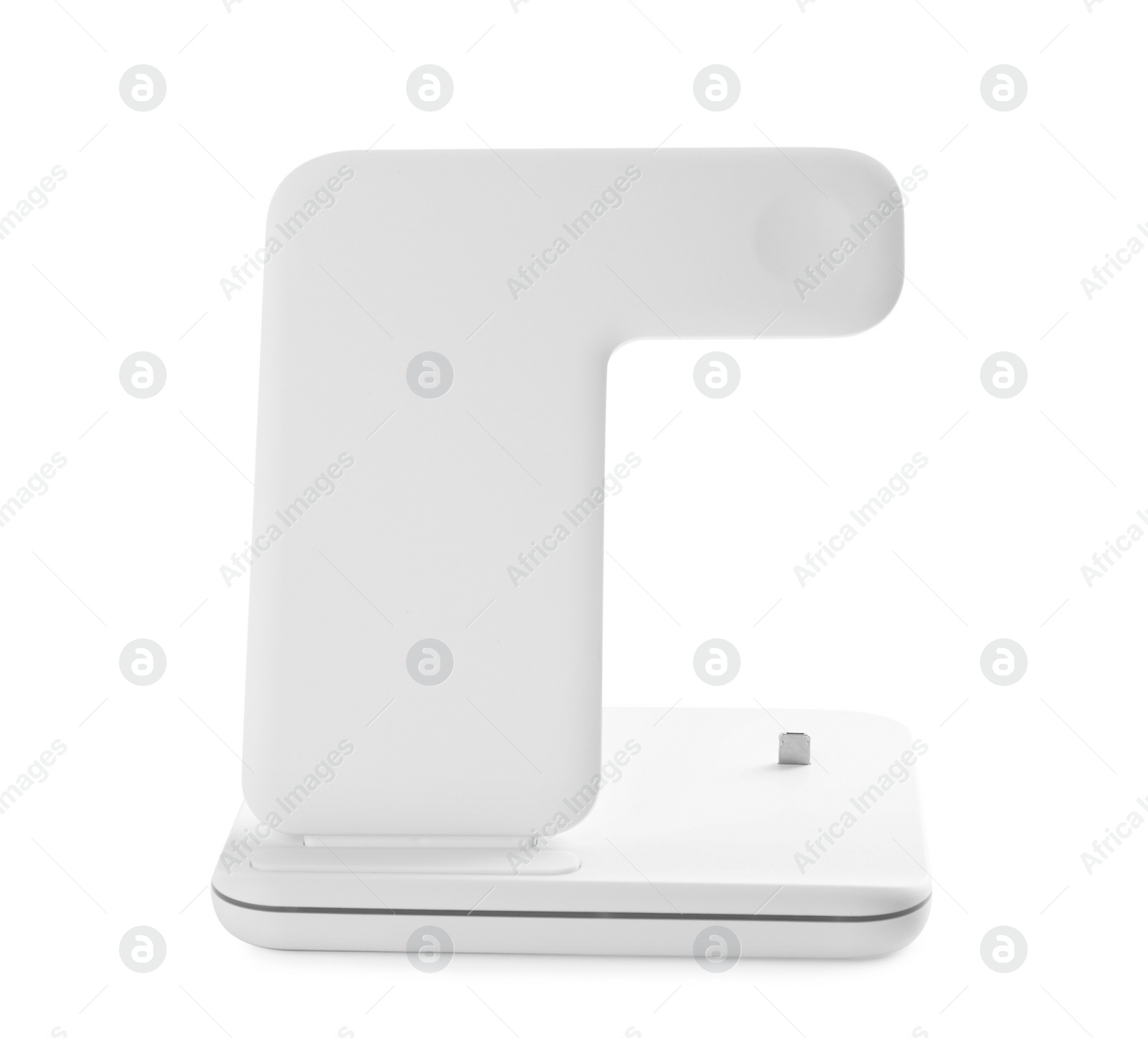 Photo of Wireless charger isolated on white. Modern technology