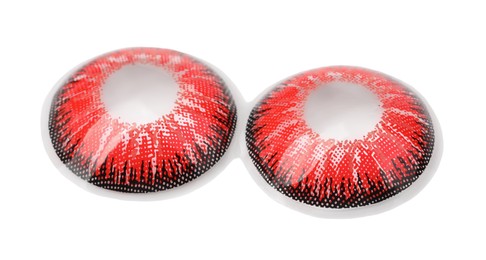 Photo of Two red contact lenses isolated on white