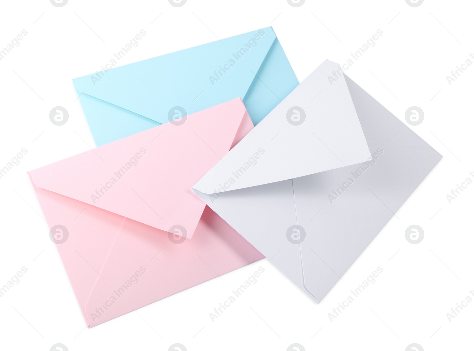 Photo of Three letter envelopes isolated on white, above view